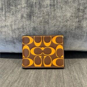 SLIM BILLFOLD WALLET IN SIGNATURE LEATHER